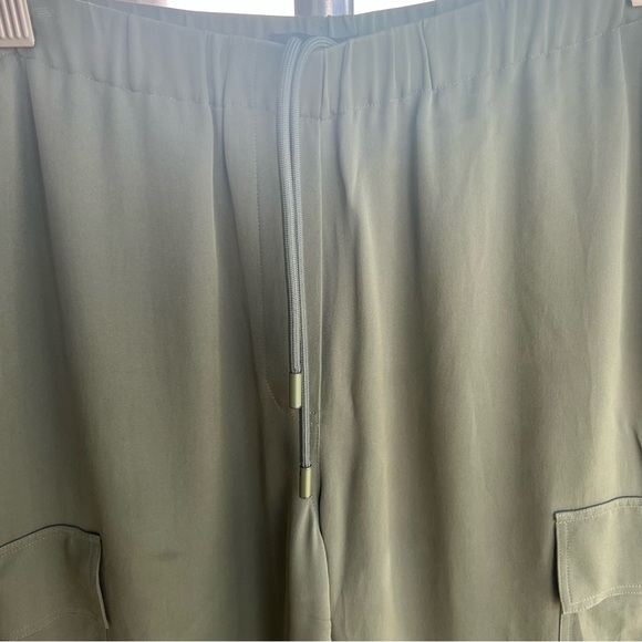 Theory Silk Utility Slim-Fit Cargo Pull-On Pants in the color Bonsai - Picture 6 of 12